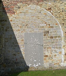 This pointed arch is all that remains of the 14th-century former chantry chapel.