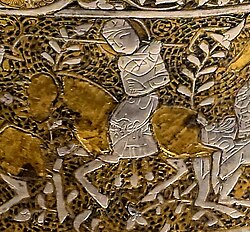 Horseman playing Polo (detail). Damascus, Syria, 1247–1249. Brass inlaid with silver. Freer Gallery of Art.[111]