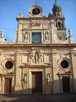 Late Mannerist façade of the church of San Giovanni Evangelista, by Simone Moschino (1604), with sculpture by Giambattista Carra da Bissone[21]