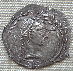 Coin depicting a man wearing a laurel wreath, modelled after the coinage of Augustus