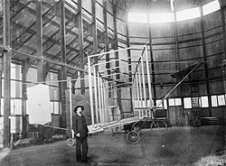 Cody in front of the frame of the British Army Aeroplane No. 1