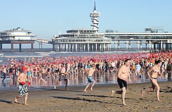 A scene of the "polar bear plunge", or Nieuwjaarsduik, at Scheveningen, Netherlands.