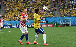 Modrić playing against Neymar of Brazil at the 2014 FIFA World Cup