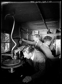 Technicians recording aviator Amy Johnson, Sydney, 1930
