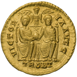Solidus of Valens showing Valentinian and Valens on the reverse, marked: victoria augg· ("the Victory of Our Augusti"). They hold together the orb, a symbol of power.