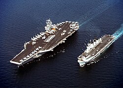 USS John C. Stennis (left) and HMS Illustrious.
