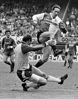 Feyenoord against AZ'67 5–2; Johan Cruyff jumps over goalkeeper Treytel.