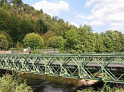 A metal bridge in a forest