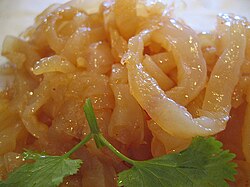Rehydrated jellyfish strips with soy sauce and sesame oil