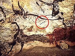 Art of Lascaux, with painted animal, and four dots, a possible notation for Lunar months[9]