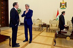U.S. Secretary of State John Kerry speaks with special presidential envoy for the Global Coalition to Counter ISIL Brett McGurk on April 8, 2016