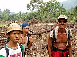 Farmers near newly cleared land within Taman Nasional Kerinci Seblat (Kerinci Seblat National Park), Sumatra