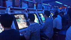 Japanese players at a shoot 'em up arcade in Akihabara, Tokyo (2017)