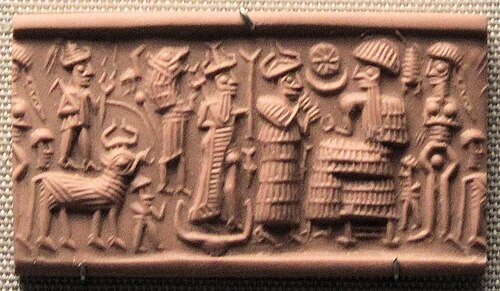 Cylinder seal impression, with three deities approaching a seated figure, probably a king: the storm god holding his lightning fork and standing on the back of a bull, the moon god holding a crescent standard and standing in a boat, and an interceding goddess. Old Assyrian period, ca 1920–1740 BC. British Museum ME 22963.[135]