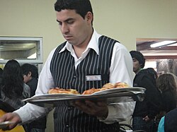 A restaurant waiter is an example of a service-related occupation.