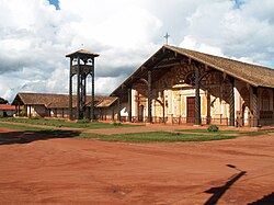 A church and bell-tower in frontal view (2006)