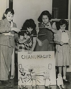 American Jewish children perform the story of Hanukah with marionettes, c. 1940