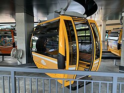 A Disney Skyliner cabin at the Epcot station on the terminus of the Epcot line.
