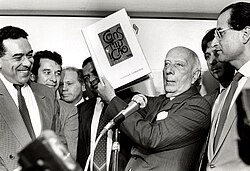Ulysses Guimarães holding the Constitution of 1988