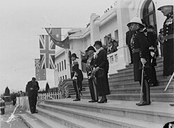 The Australian ensign and Union Jack hung vertically from Australia's Parliament House, 1931