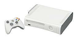 The original Xbox 360 model with an Xbox 360 controller