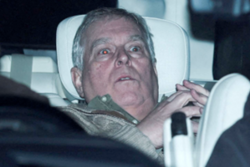 Widely circulated photograph by Phil Noble of Andrew leaving custody