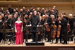 Botstein and the American Symphony Orchestra after a performance of Intolleranza by Luigi Nono at Carnegie Hall in 2018.