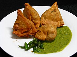 Chamuças (samosas) are an example of dish of foreign origin today widely popular in Portugal. They were first brought to the country during the Age of Discovery in the 15th century.