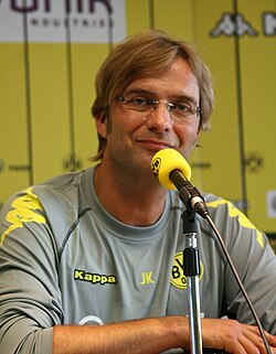 Klopp at a press conference ahead of Borussia Dortmund's title-winning 2010–11 season