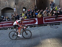 Pogačar riding to victory at the 2022 Strade Bianche