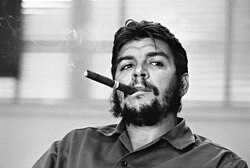 Che Guevara in his office as Minister of Industry (in the Hotel Riviera), while being interviewed by Laura Berquist for Look magazine. (1963)