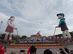 A promotional event for Squid Game at Lan Khon Mueang, a town square near Wat Suthat and Giant Swing