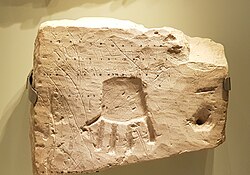 Khirbet el-Qom's hand is a symbol of Asherah as a protector,[74][page needed] but there is no scholarly hypothesis on why it appears upside-down.