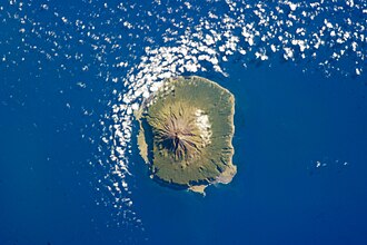 Tristan da Cunha on 6 February 2013, as seen from space. The population was temporarily evacuated to the UK in 1961 because of an eruption.