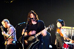Foo Fighters performing an acoustic show