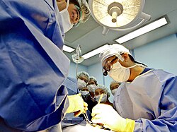 Cambodian medical students watching a surgery