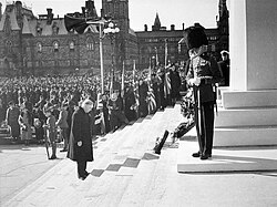William Lyon Mackenzie King lays a wreath at the future location of the National War Memorial in Ottawa, 1937