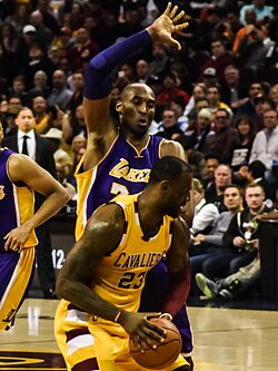 Bryant, in his final game against Cleveland, defending LeBron James in February 2016