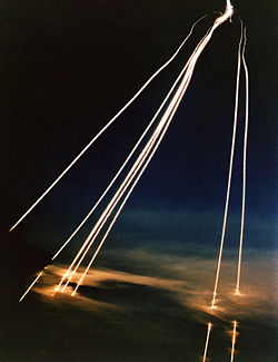 A time exposure of seven MIRVs from Peacekeeper missile passing through clouds