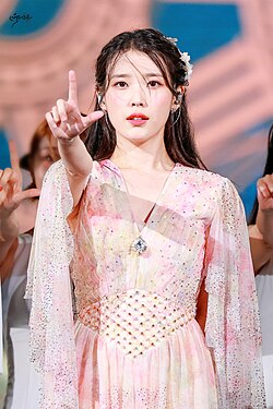 IU performing at The Golden Hour: Under the Orange Sun concert on September 17, 2022