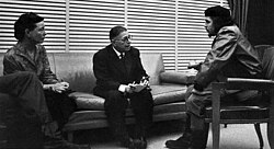 Guevara meeting with French existentialist philosophers Jean-Paul Sartre and Simone de Beauvoir at his office in Havana, March 1960. Sartre later wrote that Che was "the most complete human being of our time". In addition to Spanish, Guevara was fluent in French.[167]