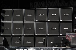 Some heavy metal electric guitarists use a large number of empty guitar speaker cabinets for the visual effect.