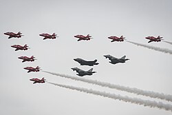 The Red Arrows in formation with an F-35B and a pair of Typhoons at the Royal International Air Tattoo in 2016
