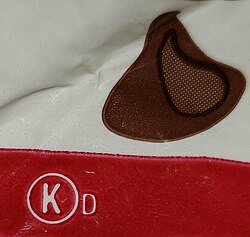 OK Kosher Certification (circled K) symbol with a dairy designation on a bag of chocolate chips
