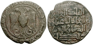 Coinage of "Zangi", emir of Aleppo (Imad ad-Din Zengi II). Dated AH 583 (1187-88 CE). Double headed eagle with the name and titles of the Abbasid caliph al Nasir on breast; mint and date around / Four line legend citing Zengi; tamghas at sides.[72]
