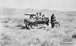 Model T Ford Utility manned by Australian soldiers and armed with Vickers .303 machine gun mounted on a tripod