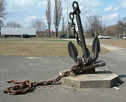 Stockless ship's anchor and chain on display
