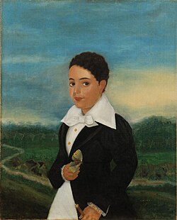 Louisiana Creole boy holding a butterfly