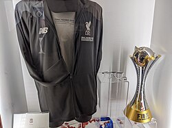 Klopp's tracksuit top, cap and glasses (from the 2019 Champions League final) and the 2019 FIFA Club World Cup in the Liverpool F.C. museum