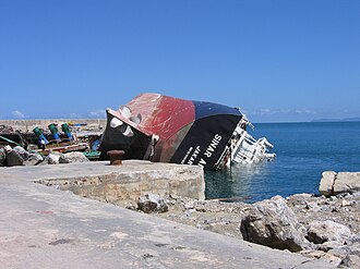 Overturned cement carrier in Lhoknga
